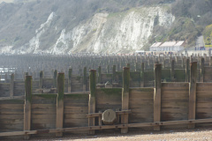 A long lens shot of beach groynes