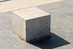 A concrete cube in a skatepark